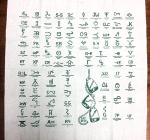 Dinner napkin featuring printed cattle brands on all 8 panels