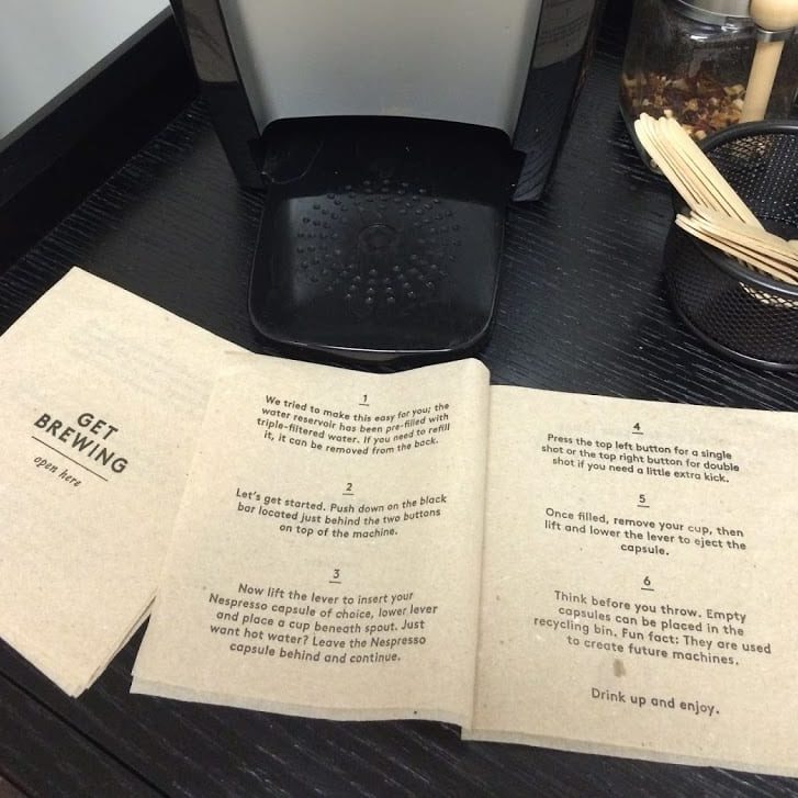Front and middle panels of "instructional booklet" custom napkin, depicting how to use Keurig coffee maker