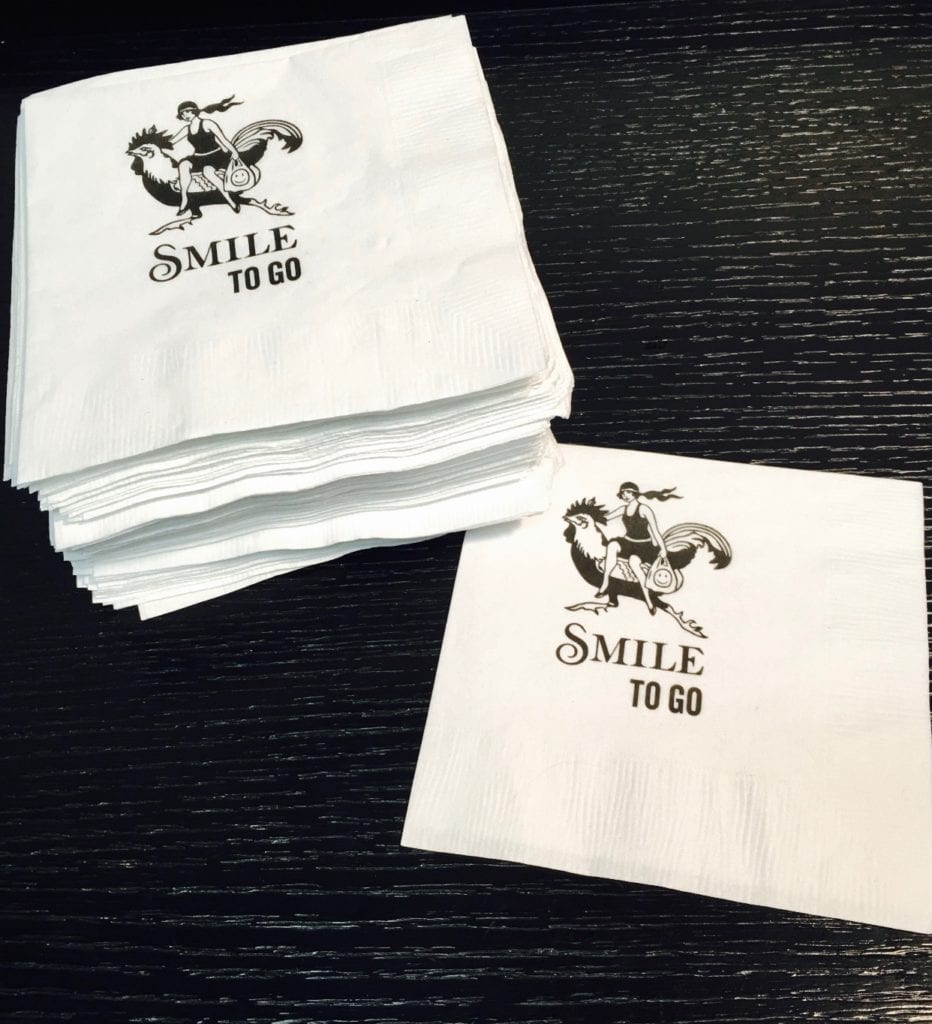 Smile to Go: stack of custom printed beverage napkins