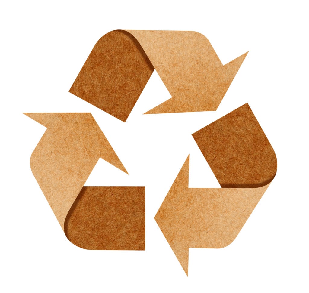 Recycling emblem made of cardboard