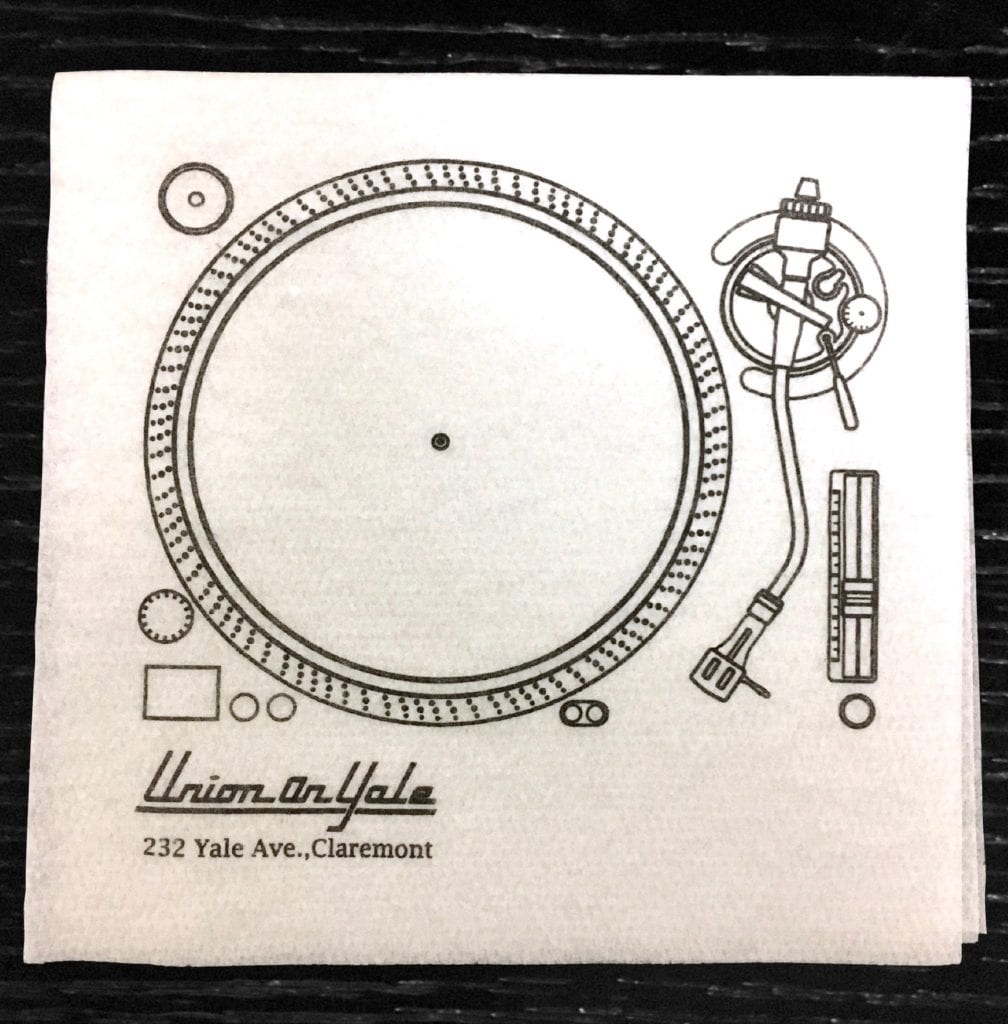 "Union on Yale" custom paper linen napkin, depiction of a record player