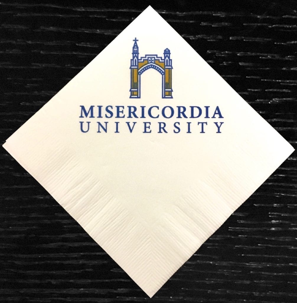 "Misericordia University" blue and yellow custom beverage napkin